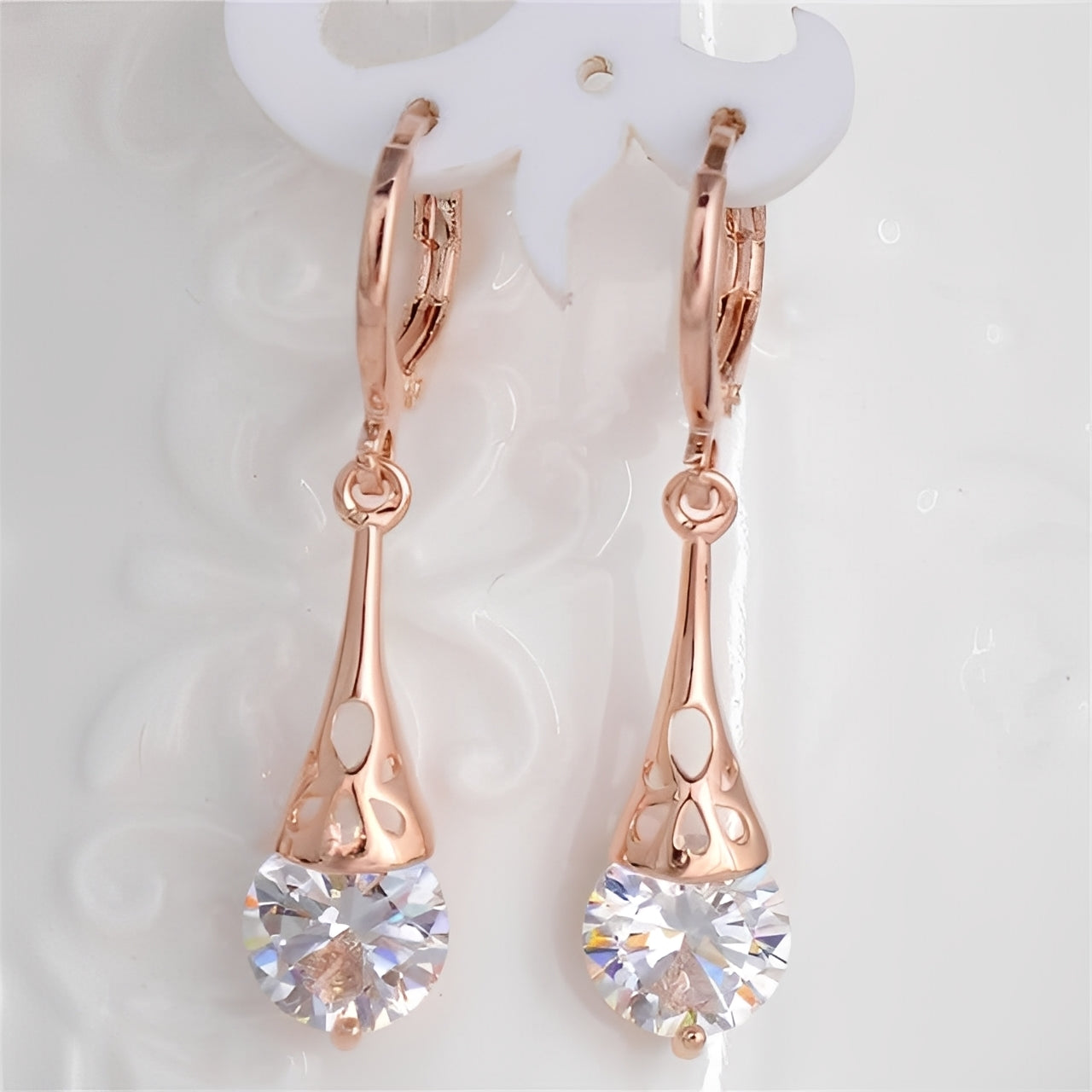 Ciela – Boucles Or Rose & Saphir Blanc