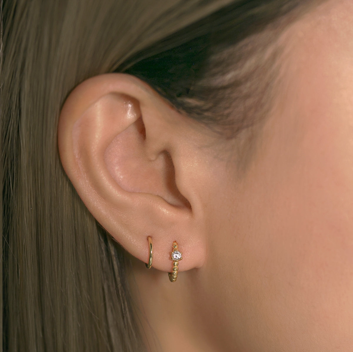 Boucles d'oreilles Huggie perles pavées