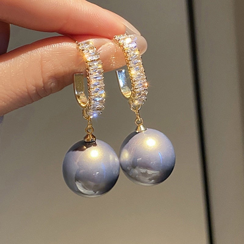 Elsa – Boucles d'Oreilles Élégantes avec Perles et Zircon
