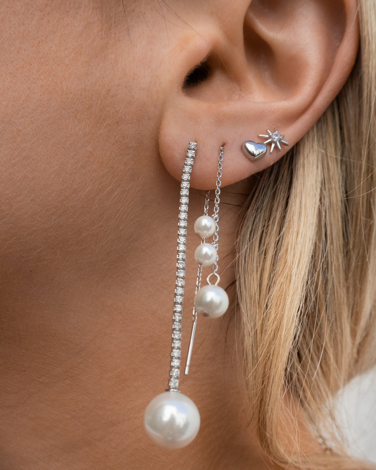 Clous d'oreilles mini cœur en argent sterling