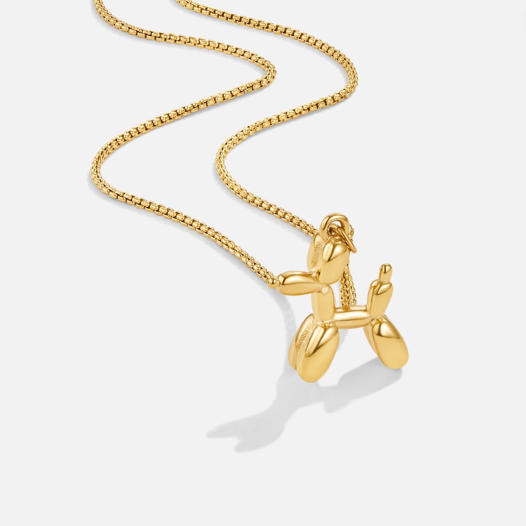 Nerina – Collier Pendentif Chien Ballon Doré