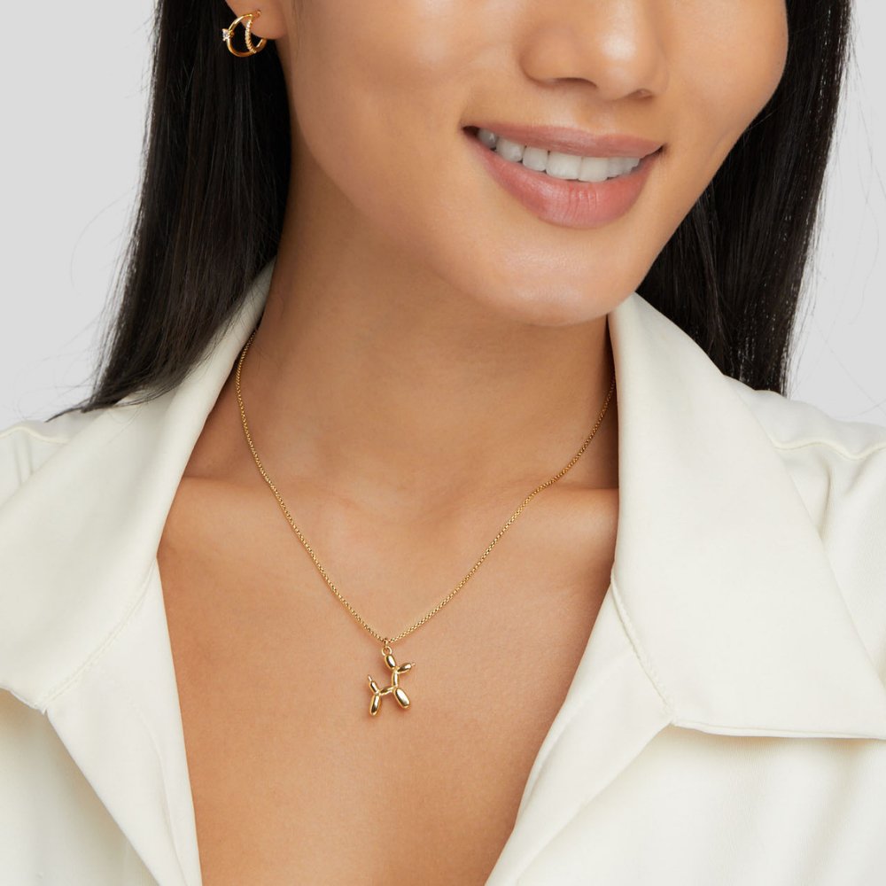 Nerina – Collier Pendentif Chien Ballon Doré