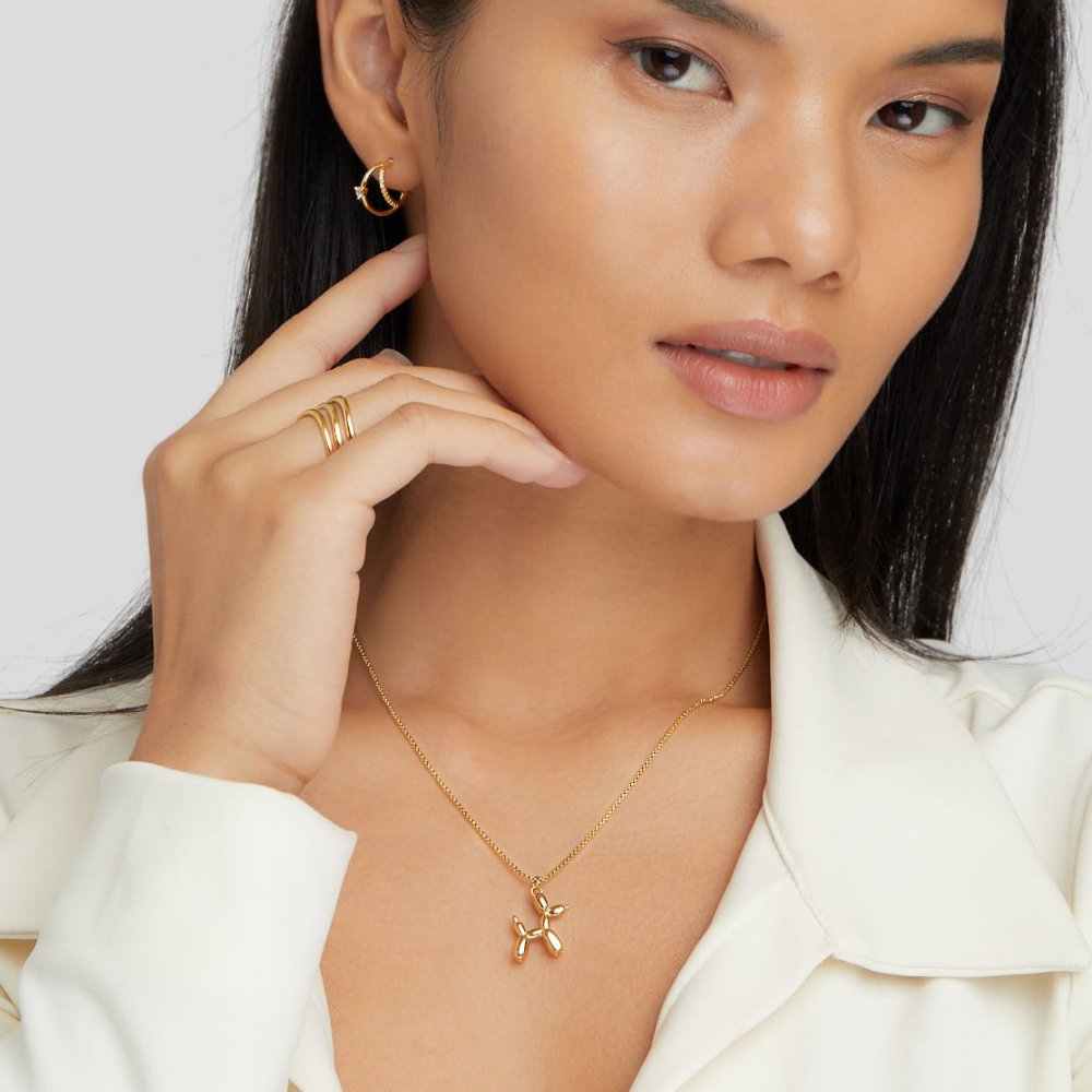 Nerina – Collier Pendentif Chien Ballon Doré