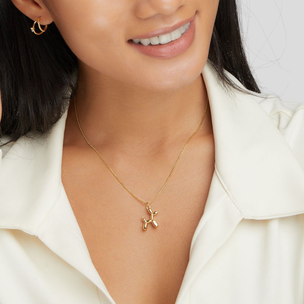 Nerina – Collier Pendentif Chien Ballon Doré