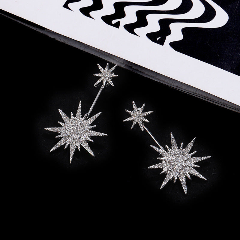 Aura – Boucles d'Oreilles Cristal Argentées Éclat Étoilé