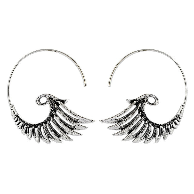 Zia – Boucles Dorées Motif Ailes