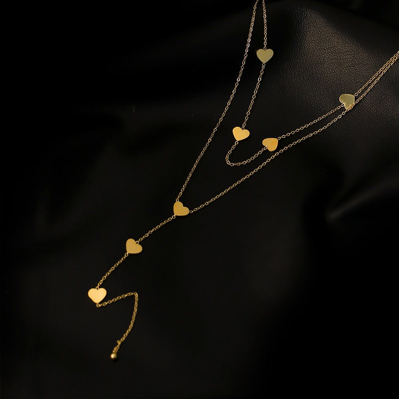 Christy – Collier Multi-Rangs Cœurs Dorés