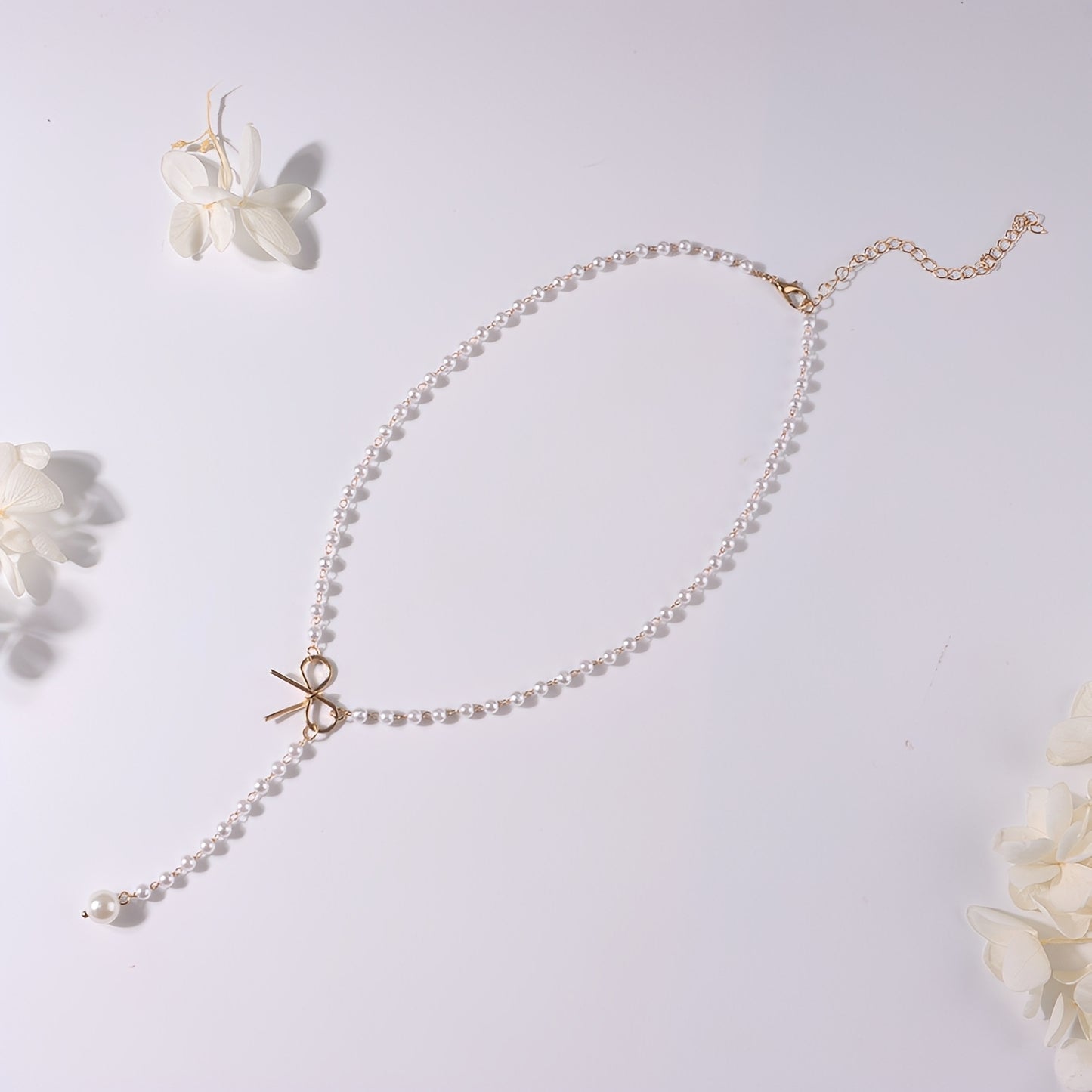 Antoneth – Collier Pendentif Nœud Papillon avec Perle