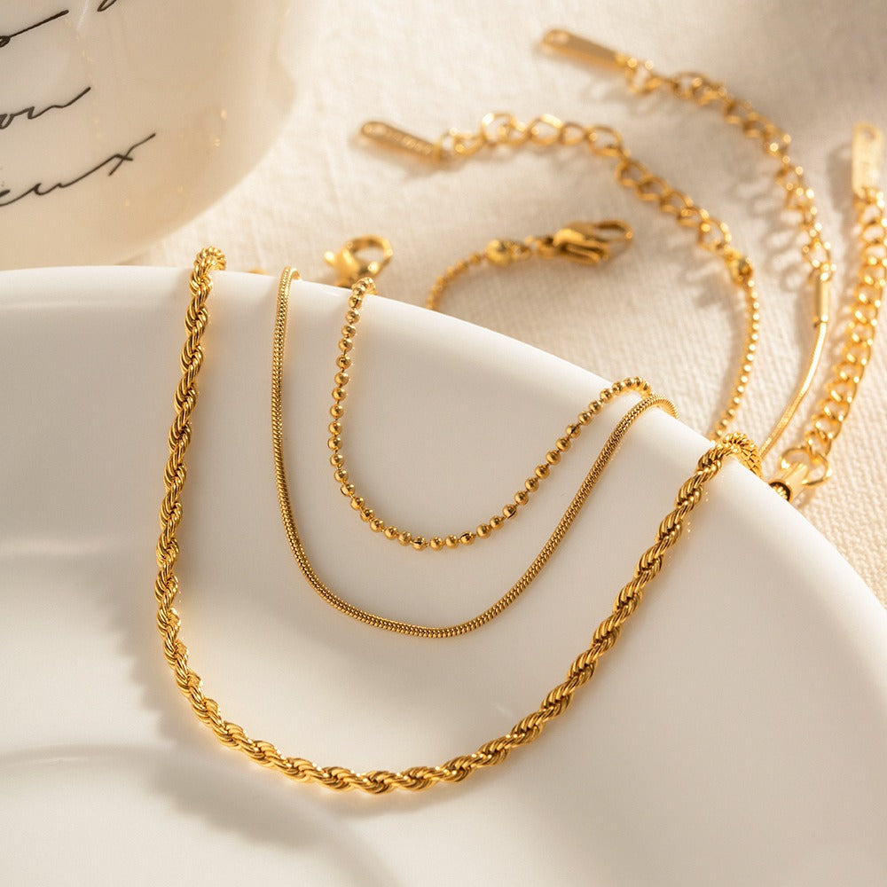 Bailey – Trio de Bracelets Fins Dorés Empilables pour Femme