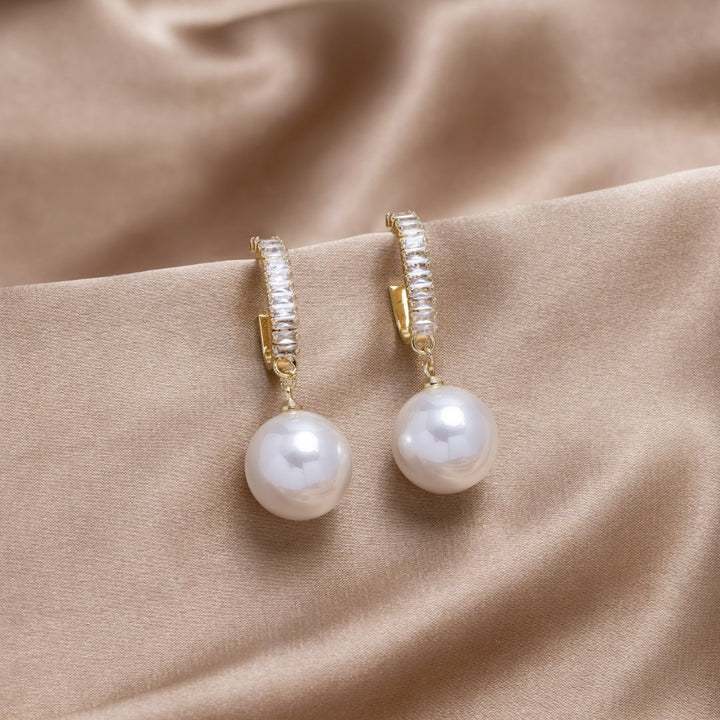 Elsa – Boucles d'Oreilles Élégantes avec Perles et Zircon