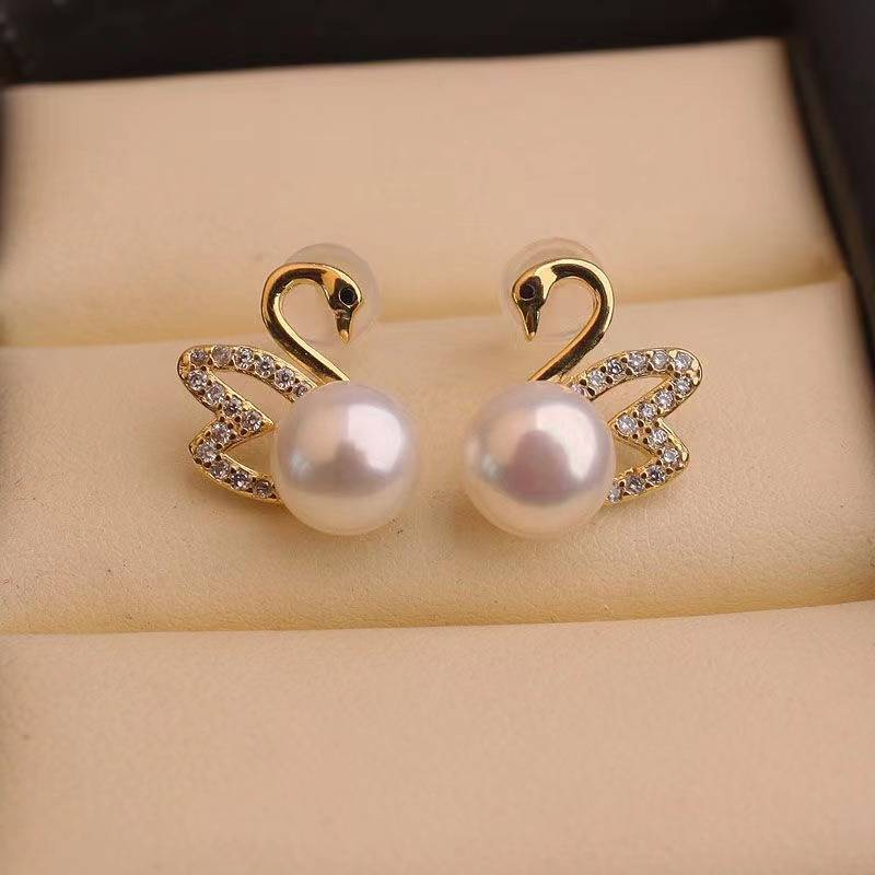 Boucles d'oreilles en or avec diamant et cygne - Boucles d'oreilles en or avec perle