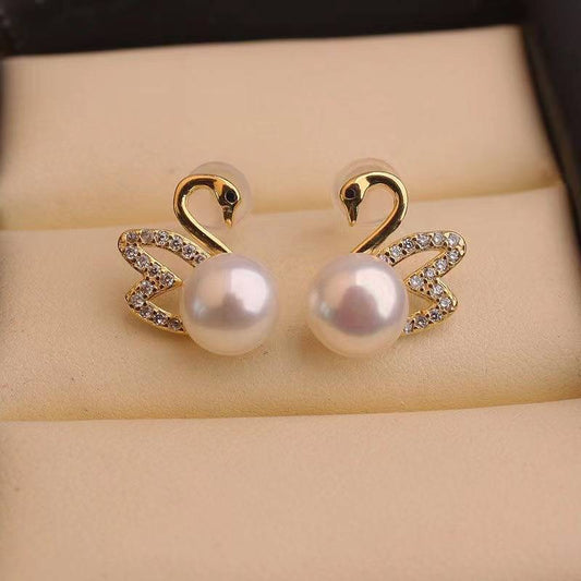 Boucles d'oreilles en or avec diamant et cygne - Boucles d'oreilles en or avec perle
