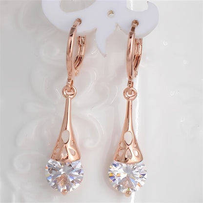 Ciela – Boucles Or Rose & Saphir Blanc