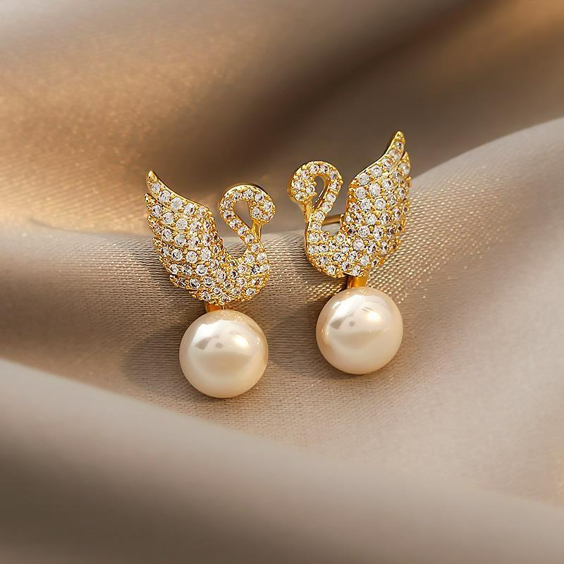 Boucles d'oreilles en forme de cygne avec perles - Élégance naturelle