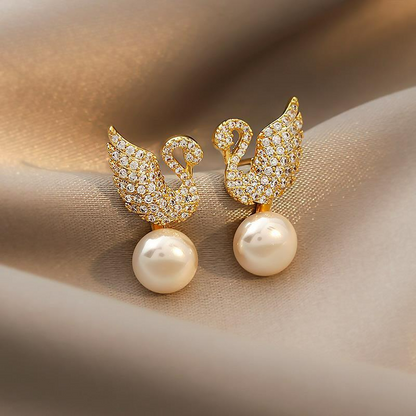 Boucles d'oreilles en forme de cygne avec perles - Élégance naturelle