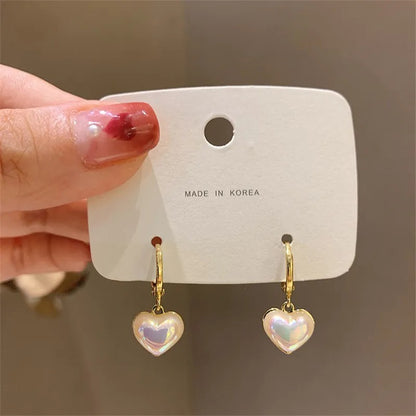 Noreen – Boucles d’Oreilles Cœur Élégantes avec Perle