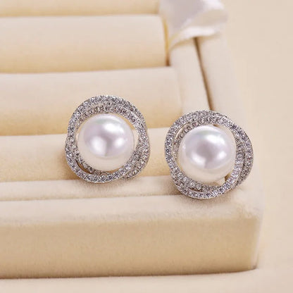 Aveline – Boucles d’oreilles élégantes à perles en spirale