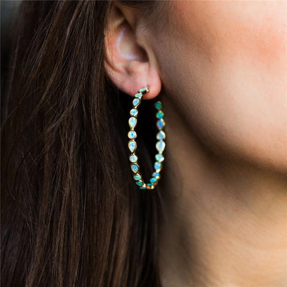 Luminose Élégance – Boucles d'oreilles en or et opale bleue