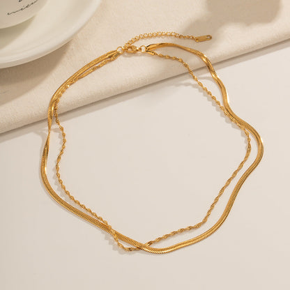 Chaîne torsadée double - Collier superposé en or