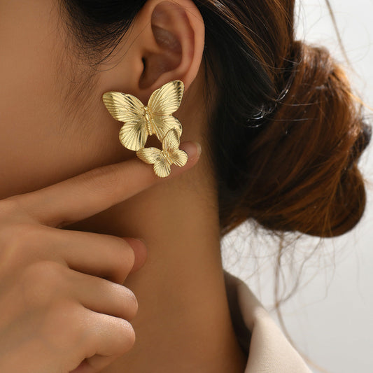Aurelia – Boucles d’Oreilles Papillon Élégantes