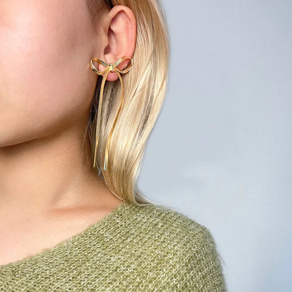 Nira – Boucles d’Oreilles Nœud Délicates