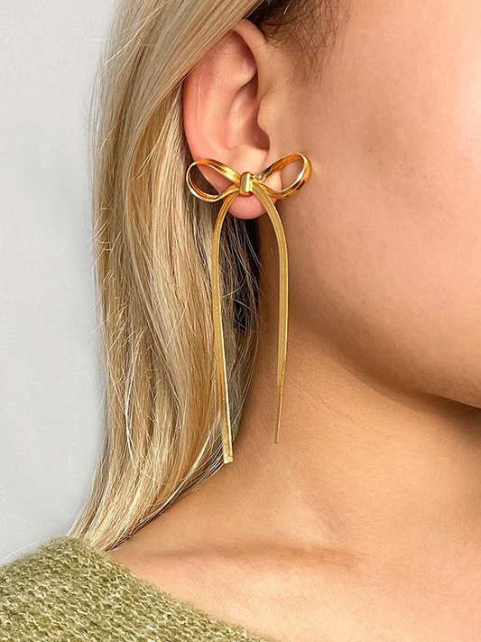 Cate – Boucles d’Oreilles Longues Nœud Chaîne Serpent Dorées