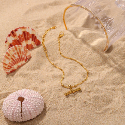 Chloe – Bracelet de Cheville Bar Doré Raffiné