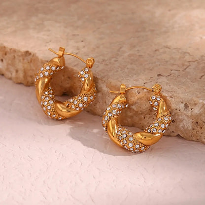 Aureva – Boucles d’oreilles U torsadé doré