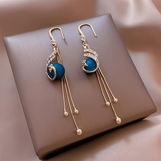 Sheynn – Boucles d’Oreilles de Fête avec Perles Bleues