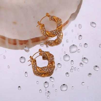 Aureva – Boucles d’oreilles U torsadé doré