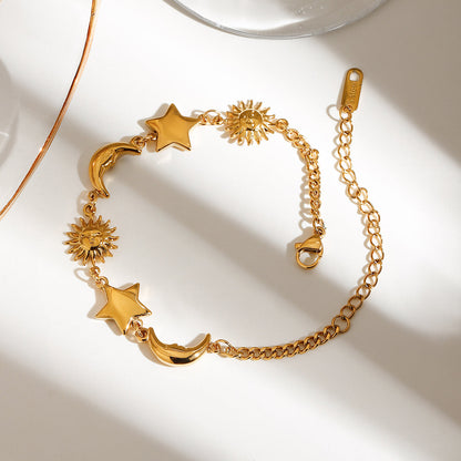 Celina – Bracelet Pendentifs Étoile, Lune et Soleil Doré