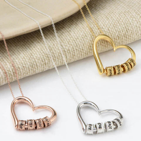 Maya – Collier Cœur avec Anneaux Gravés