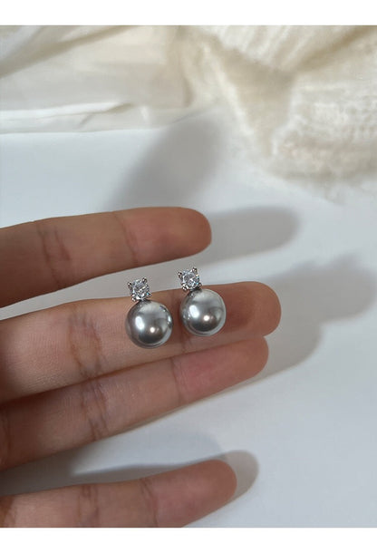 Noire – Boucles d'oreilles pendantes intemporelles avec perles noires