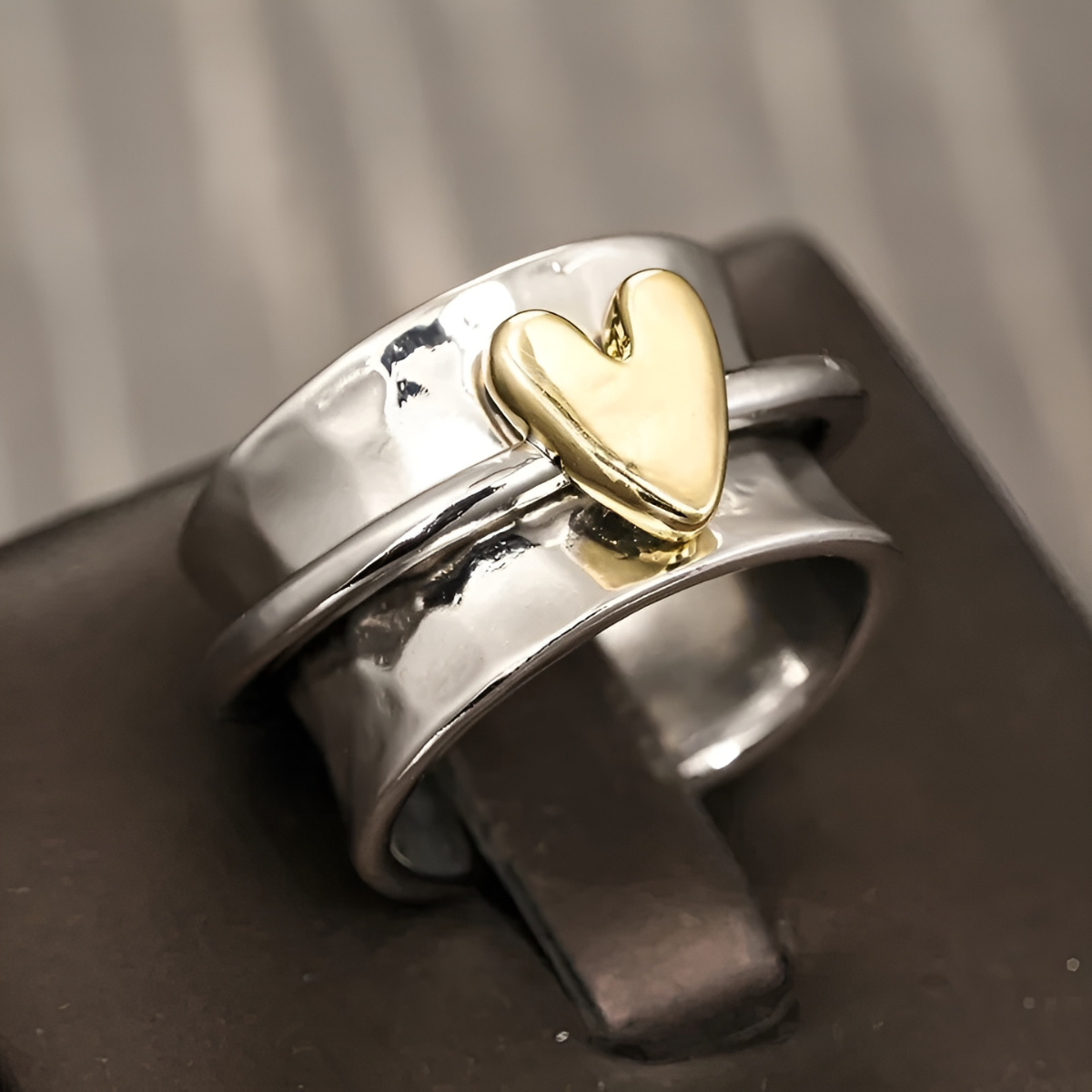 Pia – Bague Rotative Cœur Pêche Décompression