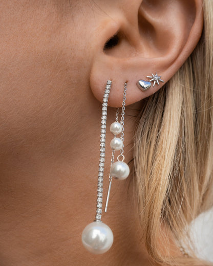 Clous d'oreilles mini cœur en argent sterling