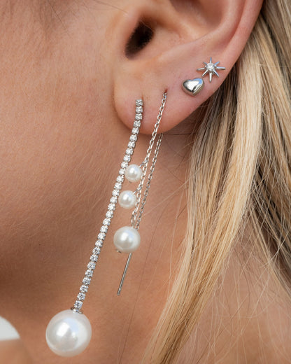 Clous d'oreilles mini cœur en argent sterling
