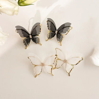 Jean – Boucles d’Oreilles Papillon en Maille Aérienne
