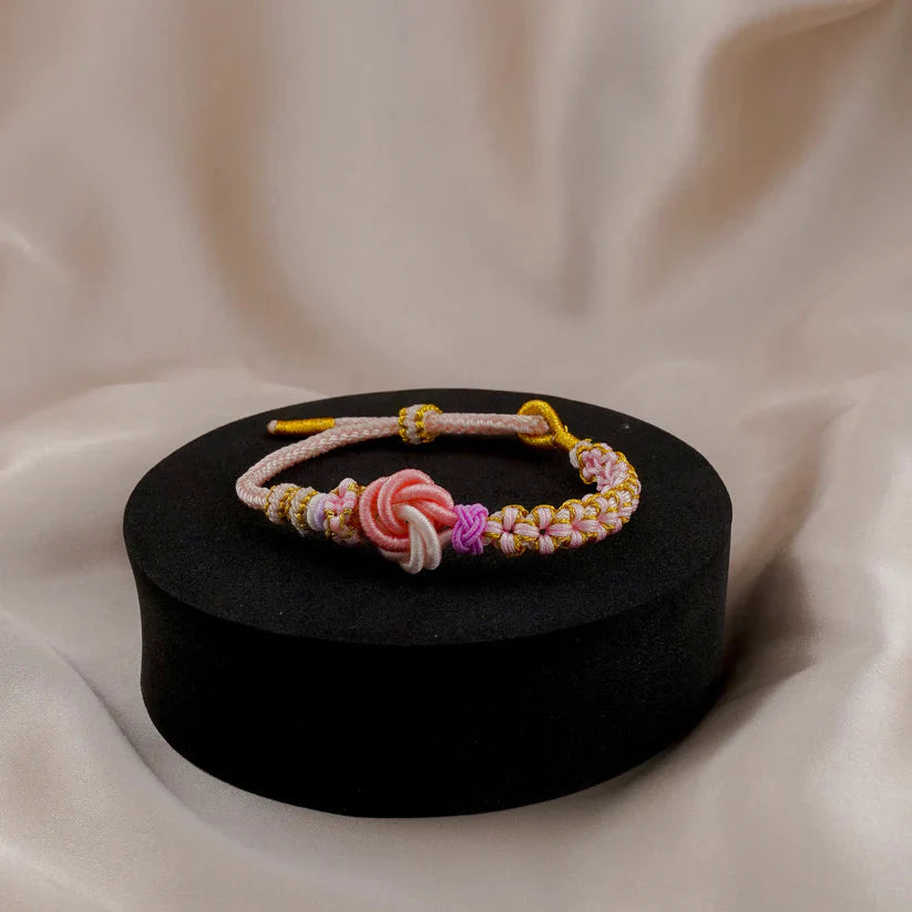 Akari – Bracelet Rouge Tressé Porte-Bonheur