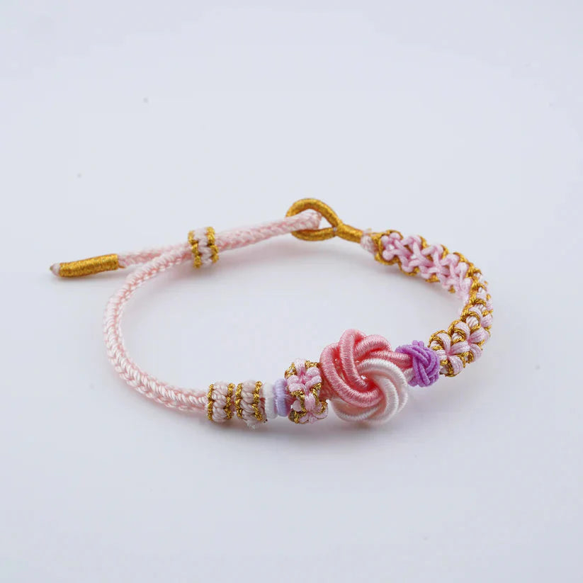Akari – Bracelet Rouge Tressé Porte-Bonheur