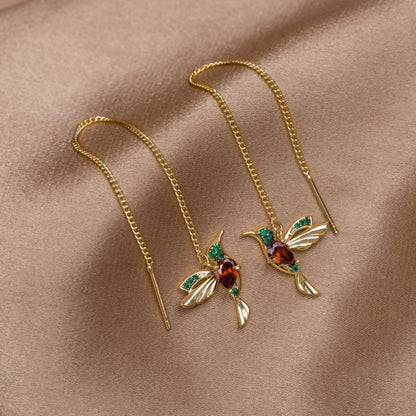 Lunara – Boucles d’Oreilles Colibri à Pampilles Cristal