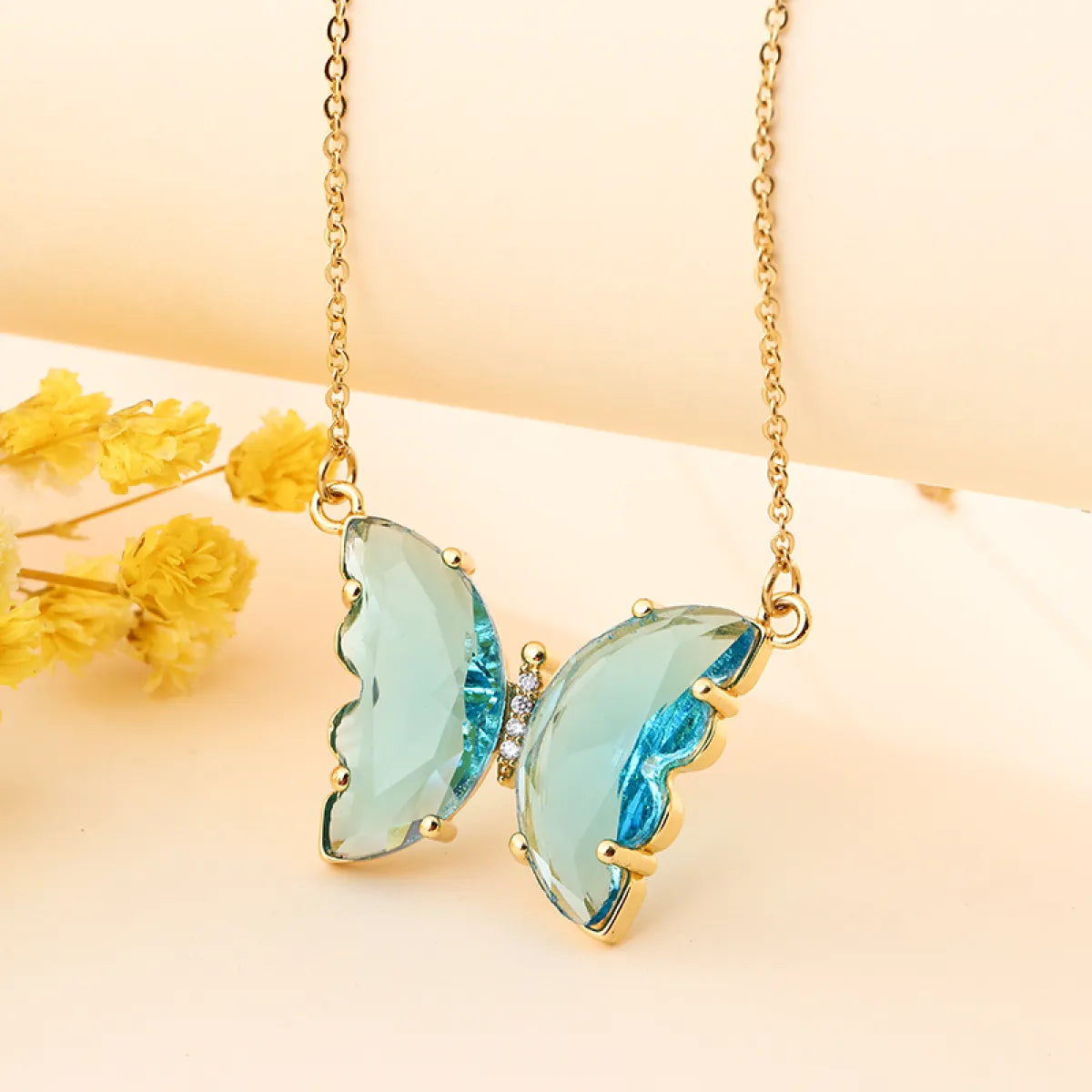 Collier papillon petit et coloré