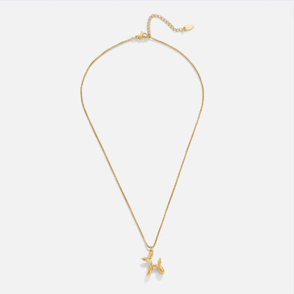 Nerina – Collier Pendentif Chien Ballon Doré