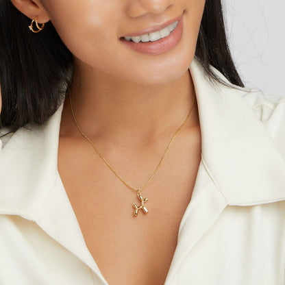 Nerina – Collier Pendentif Chien Ballon Doré