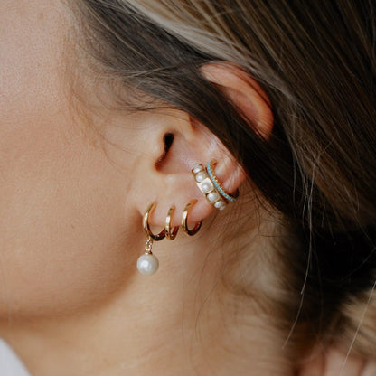 Isola – Boucles Dorées à Pendantif Perlé