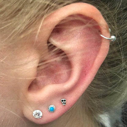 Reem - Boucles d'oreilles Clous Petit Crâne