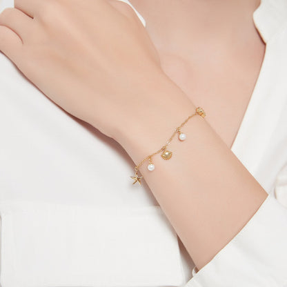 Bracelet Charm Coquillage et Étoile de Mer