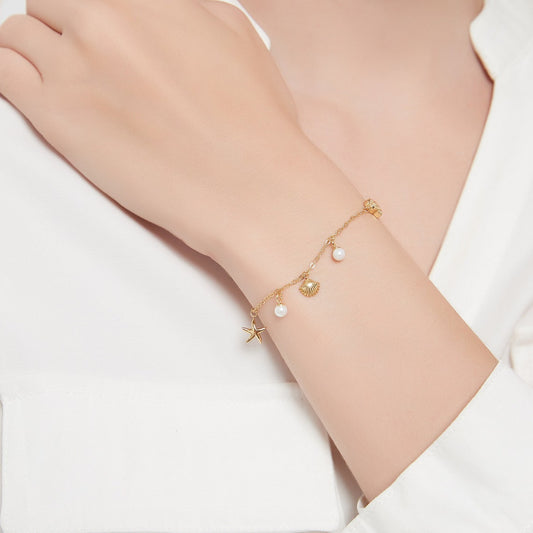 Bracelet Charm Coquillage et Étoile de Mer