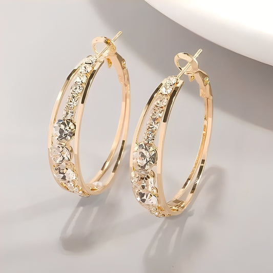 Raya – Boucles d'Oreilles Dorées Élégantes