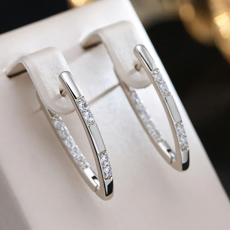 Lyssia – Boucles d’Oreilles Dorées Élégantes avec Zircon