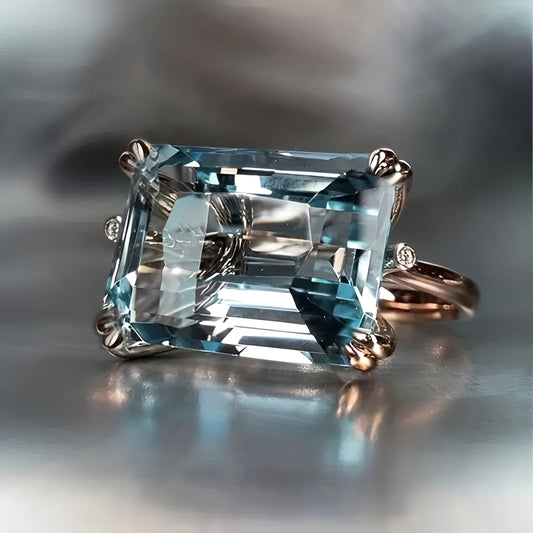 Nadine – Bague Classique Dorée au Zircon Bleu